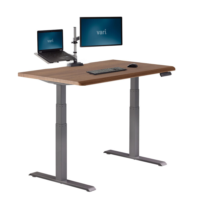 angle view of electric standing desk with comfort edge in walnut image number null
